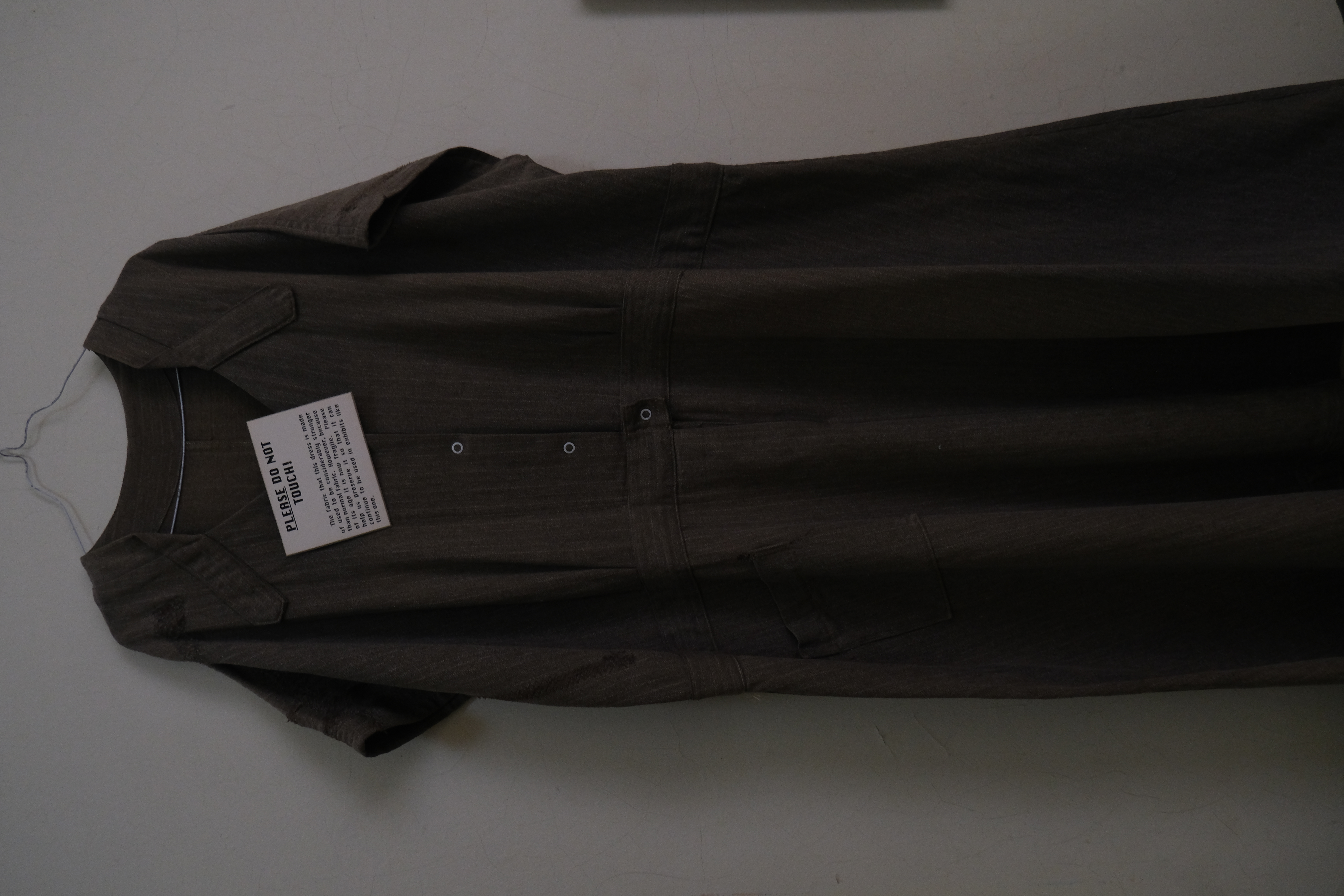 Independence State Hospital's museum displays a dress that female patients would have helped sew and later wear