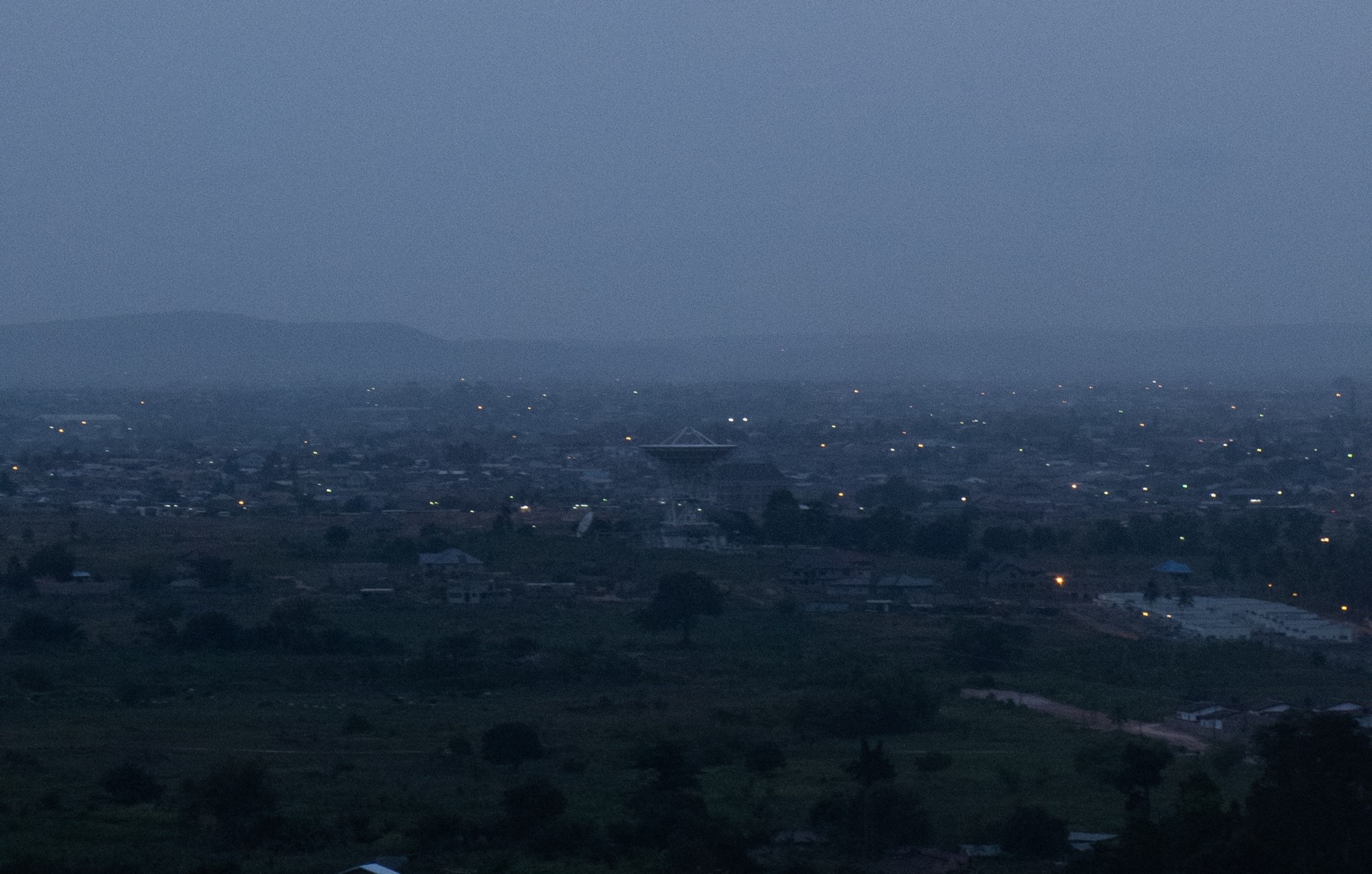 The Ghana Radio Astronomy Observatory from a distance at night, photograph by James Merron 2019